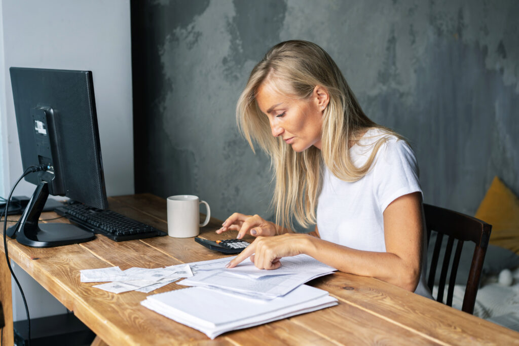 young business woman sitting at a desk