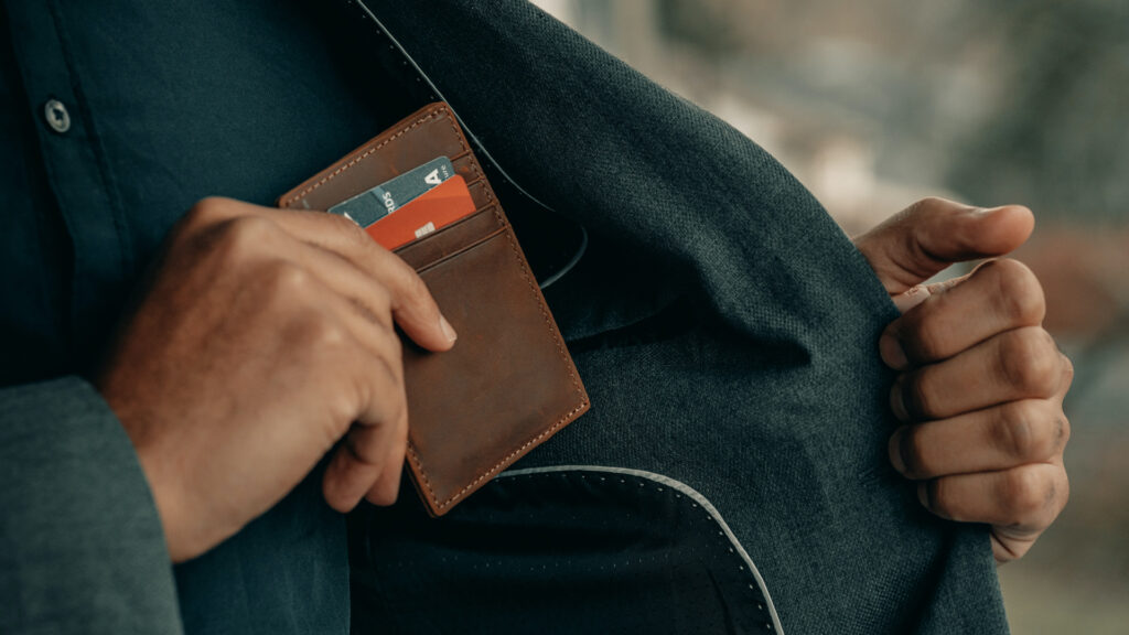 hand putted wallet in jacket with credit cards