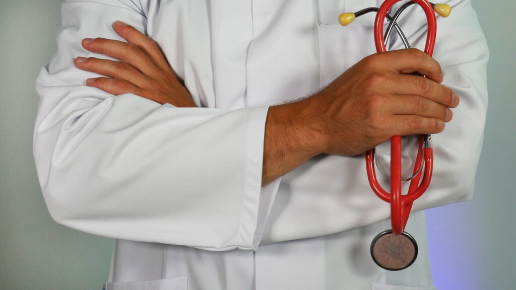 picture of doctor holding medical equipment