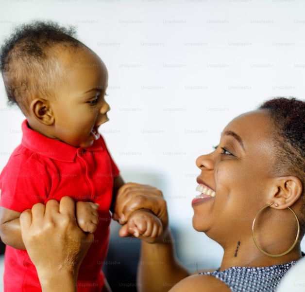 woman playing with her small child