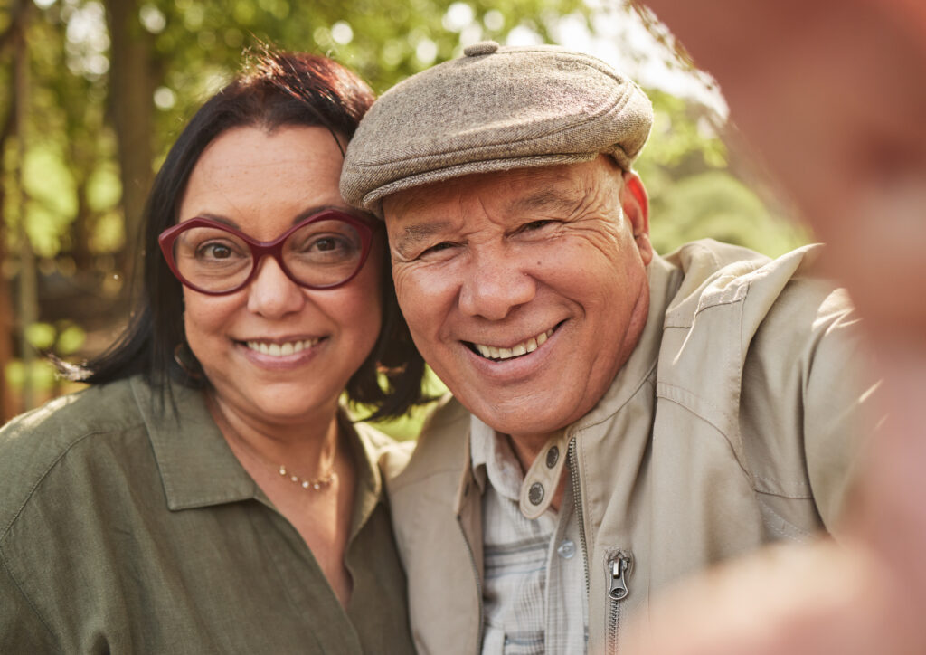 older couple taking a selfie