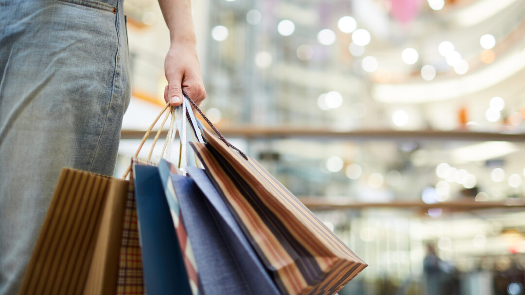 person with bags seasonal shopping