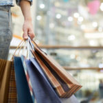 person with bags seasonal shopping