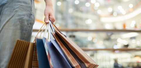 person with bags seasonal shopping