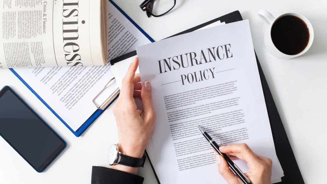 Insurance Policy with pen