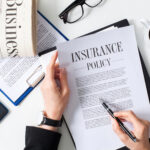 Insurance Policy with pen