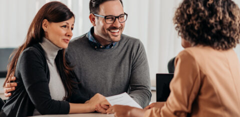 husband and wife meeting with banker