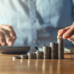 piles of coins getting bigger like steps